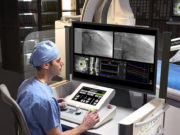 Surgeon driving CorPath GRX system